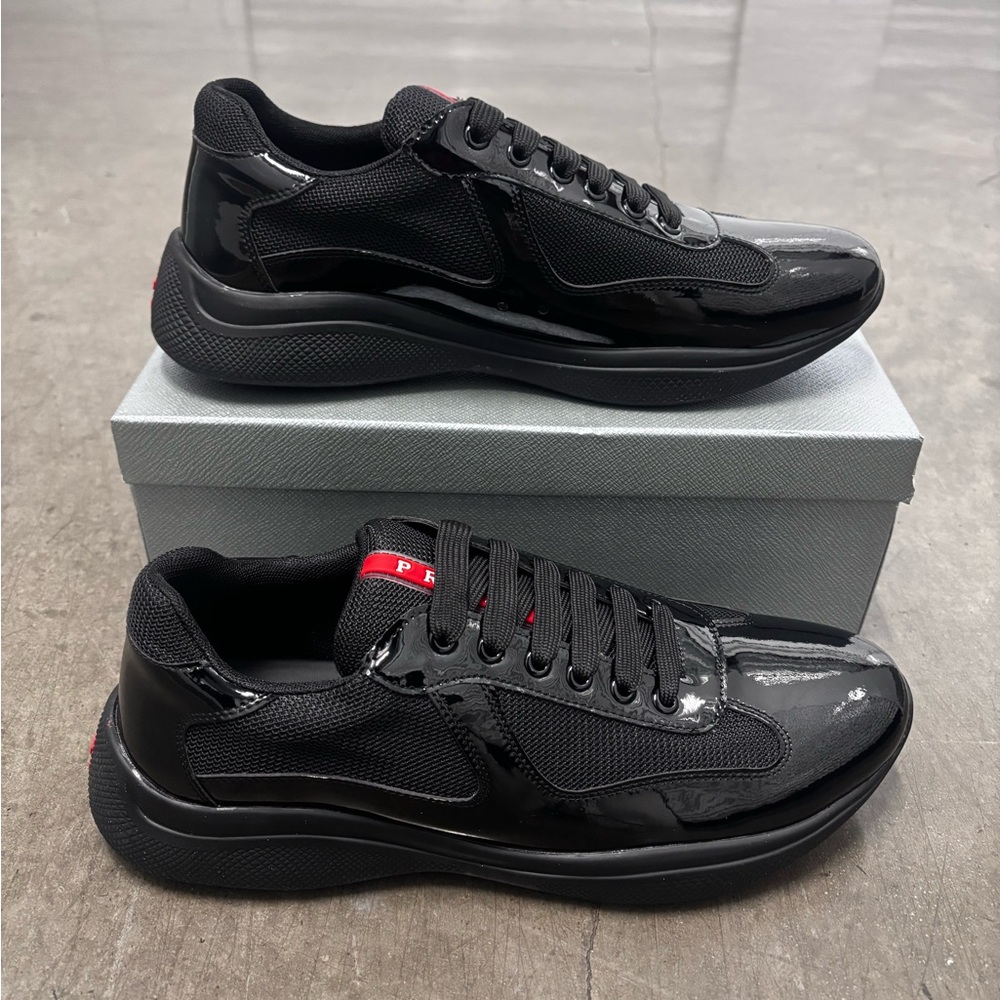 Prada Black Low-Top Sneakers with Red Tongue Tab